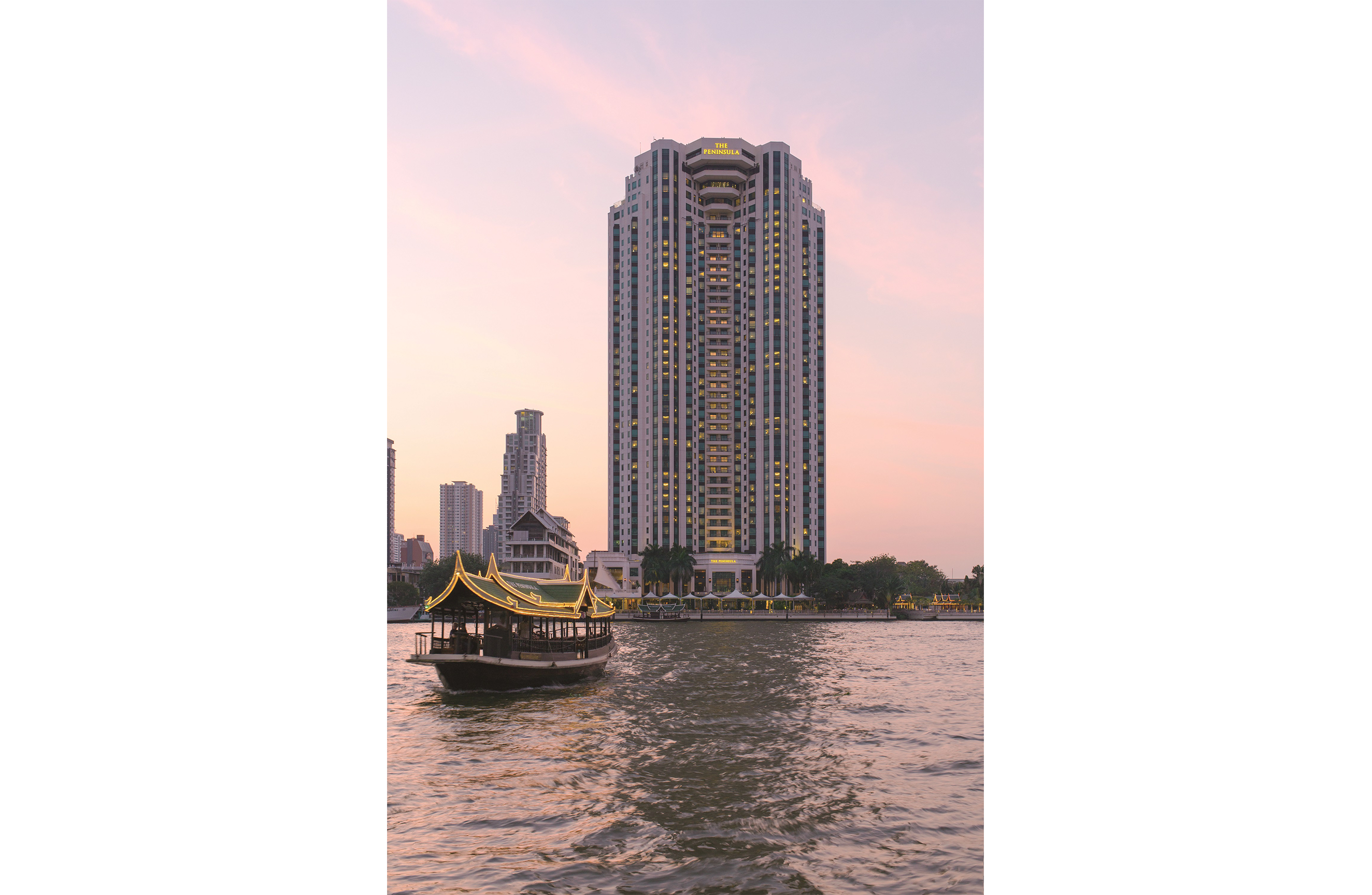 The Peninsula Bangkok and boat
